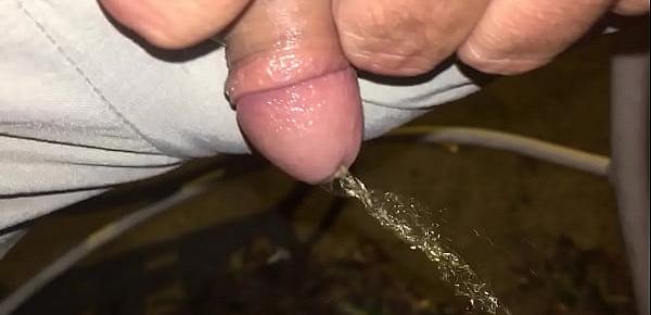  Tiny dick pissing outside